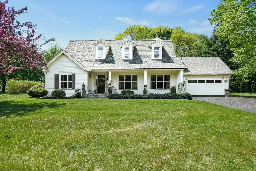 Traditional Home Exterior Update with Natural Stone Accents