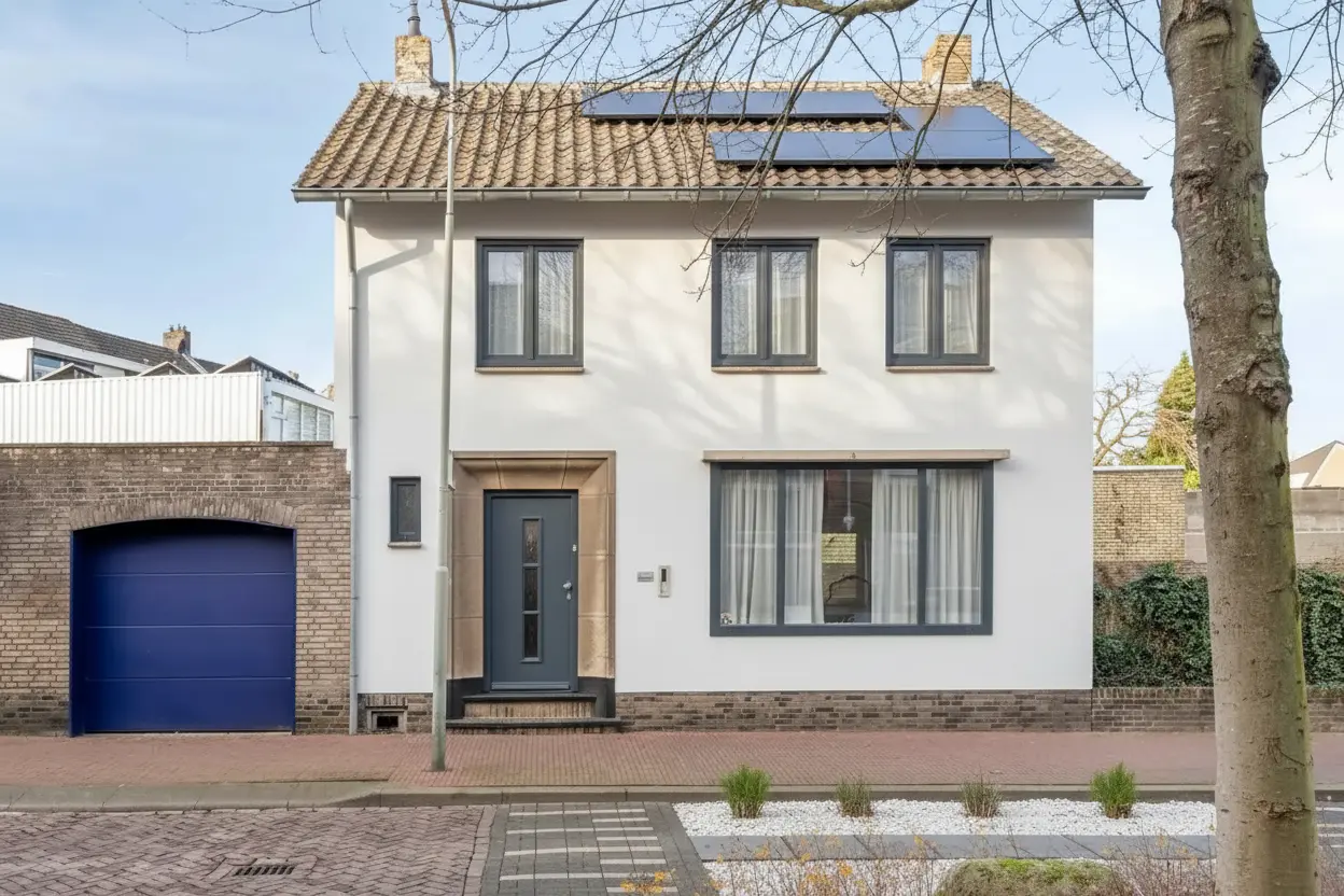 Modern Exterior Remodel Design: White Facade, Grey Accents & Solar Panels